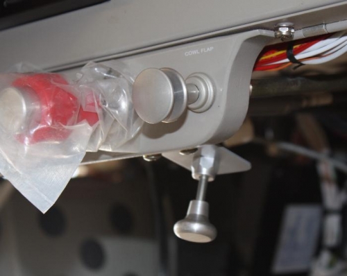 Push-pull control cable and bracket.