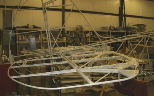 Wood clamps hold elevator at neutral