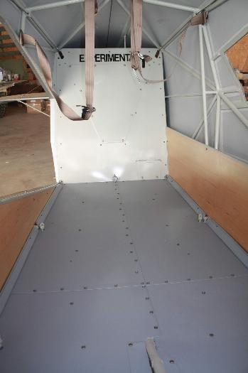 Aft floorboards and bulkhead, including EXPERIMENTAL sign.
