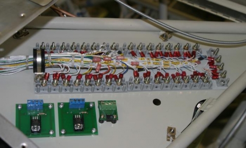 Breakout panel with light dimmers and headset power supply.