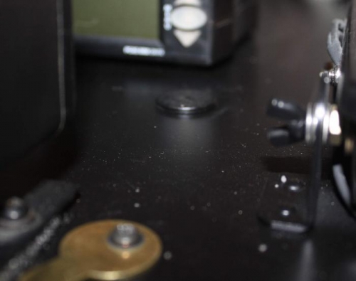 Correction Magnet in background, adjustment key in foreground.