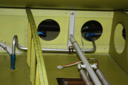 Right wing to left underwing fuel vent fitting.