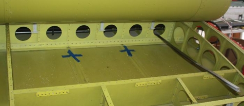 Washers taped to access panel ribs.