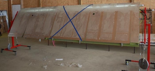 PVC coating removed from rivet lines, X marks where protrusions exist on the wing undersurface.