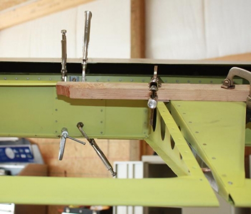 Flap - Aileron clamped with bushing.