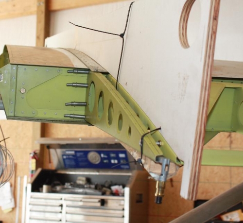 Inboard flap with bushing and template.