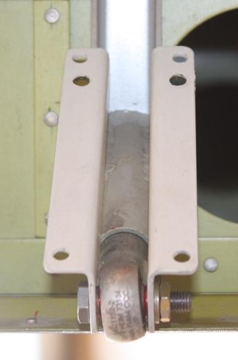 New upper hinge holes.