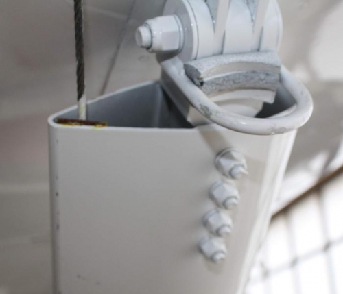 Strut wear point with phenolic strip.