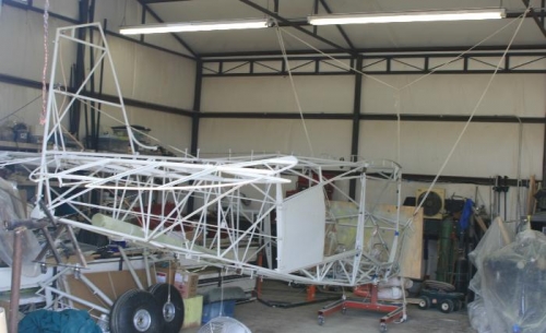 Fuselage remounted on rotisserie.