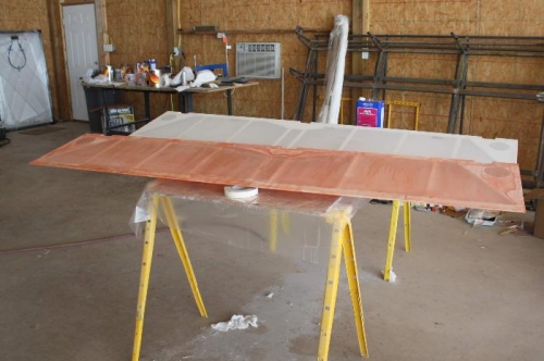 One flap done, three surfaces to go.