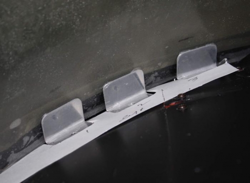 Three support tabs and template to keep spacing symmetric.