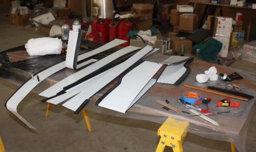 Neoprene tape and weatherstrip applied.