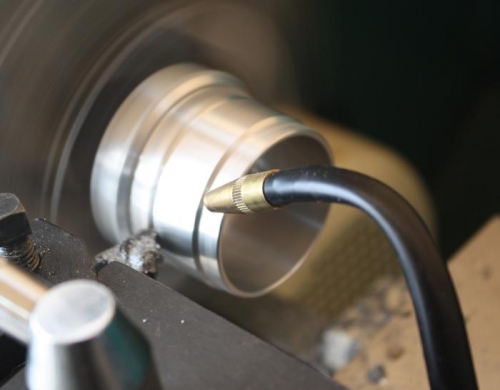 Trimming main fuel filler neck insert.