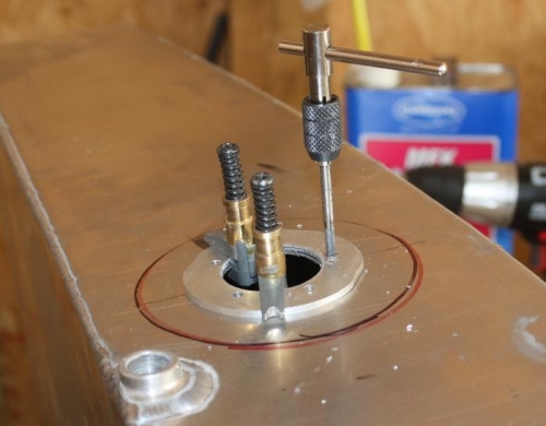 Tapping fuel sender flange.