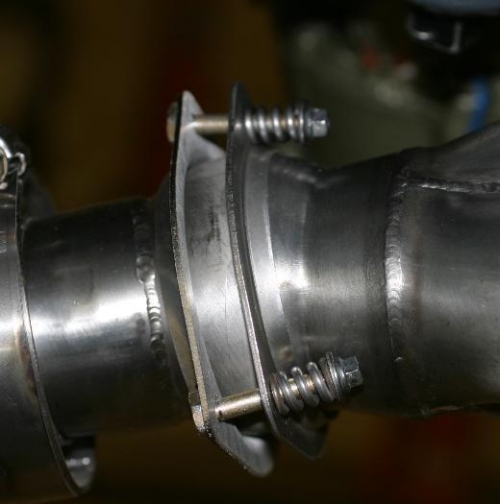 Oversize flange causes bolt tilt.