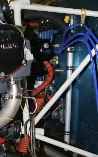 Breather tube on firewall.