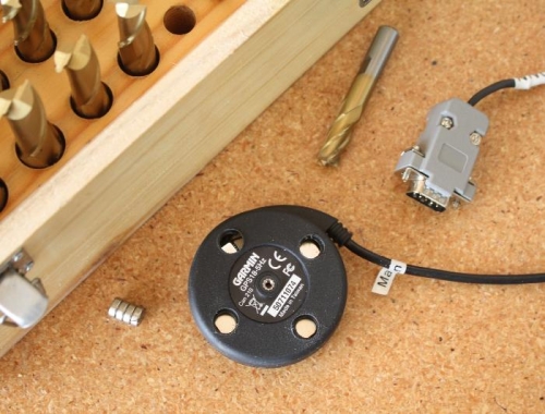 Puck, end cutter, and magnets.