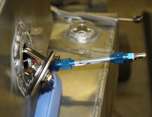 Assembling fuel tank sender for pressure testing.