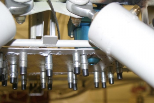 The gascolator extends below about 1/2 inch.