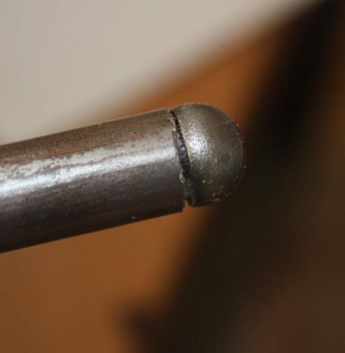 Starting the process hacksawing next to the pushrod end 