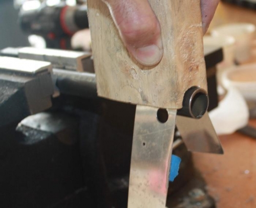 Bending fairing over 7/8 tube with 1 inch diameter semicircle wood block.