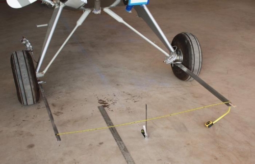 Checking Toe-In for each wheel relative to the fuselage longitudinal axis.