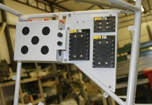 Mounted battery and fuse blocks