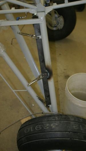 Additional midway brake hose tab