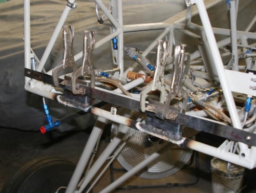 Cowl flap brackets used as jig.