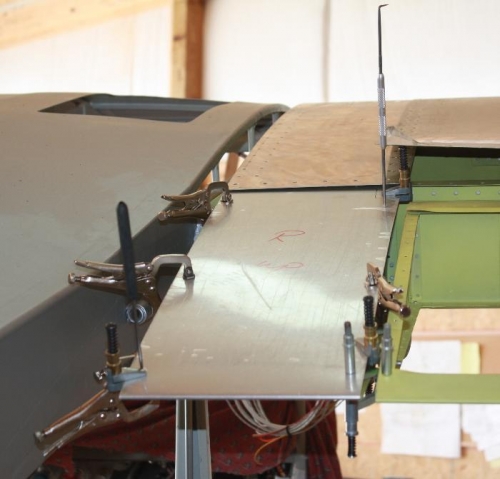 Aligning pilot holes.