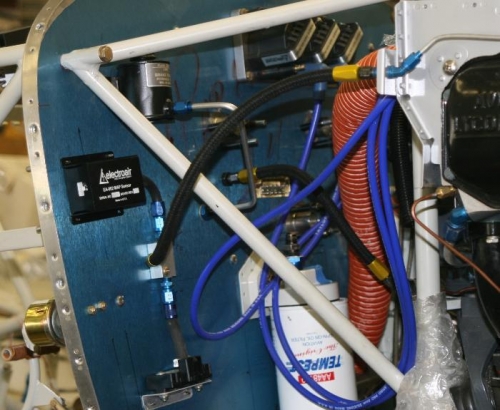 Manifold pressure and primer hose.