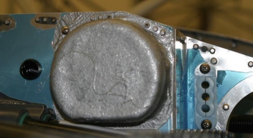 Magneto cooling duct and ignition wire baffle seal.