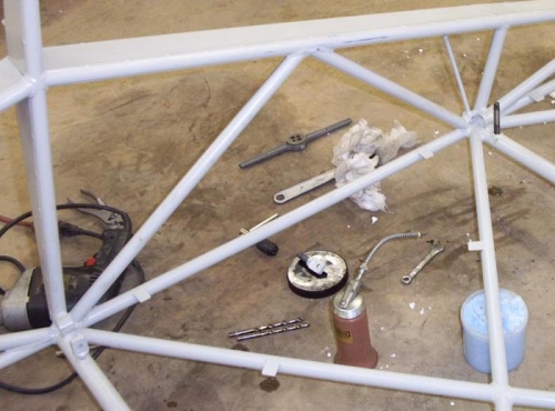 Rear seat mount tapping