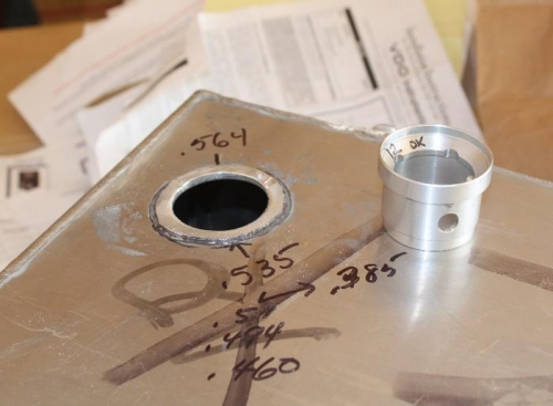 Fuel filler neck and sleeve after trimming and drilling.