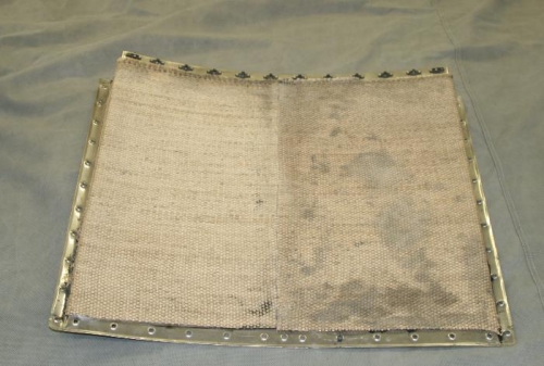 Adhesive applied - the dark stains are adhesive seeping thru.