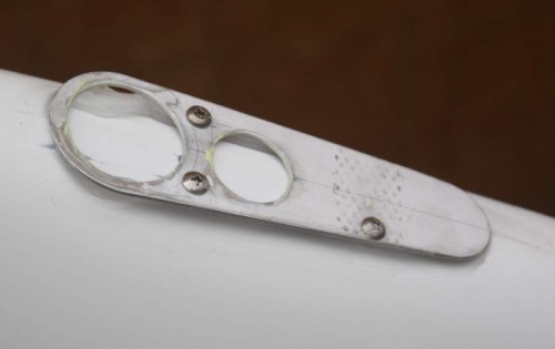 Nav light bracket retained with #6 sheet metal screws over RTV base.