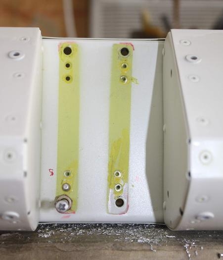 Installing nutplates.