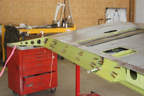 Bottom surface riveted.