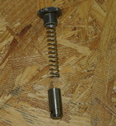 Oil pressure bypass piston and spring.