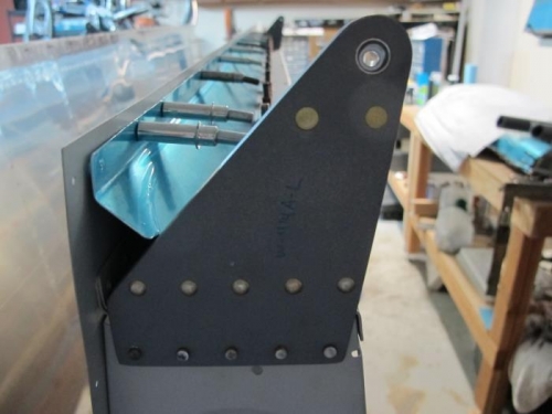 Aileron Bracket Riveted to Wing