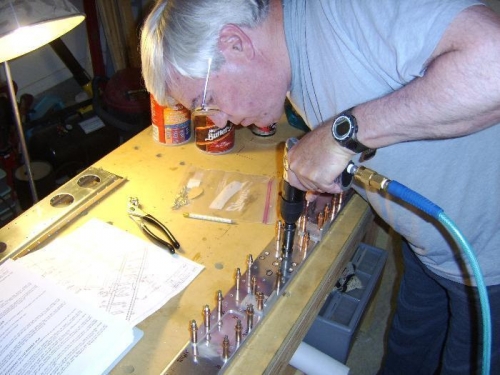 Countersinking the indicated holes