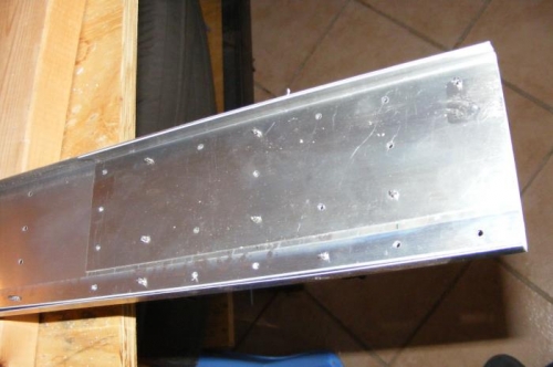 Multiple additional plates added to spar root