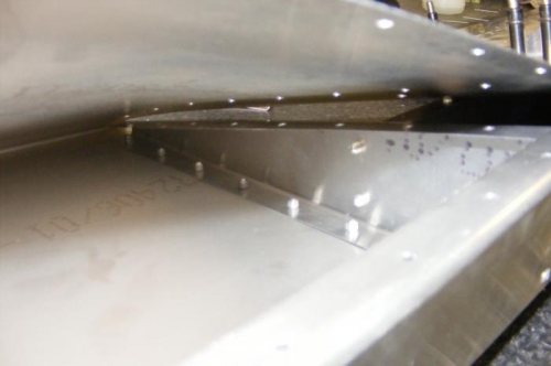 Internal ribs riveted on one side