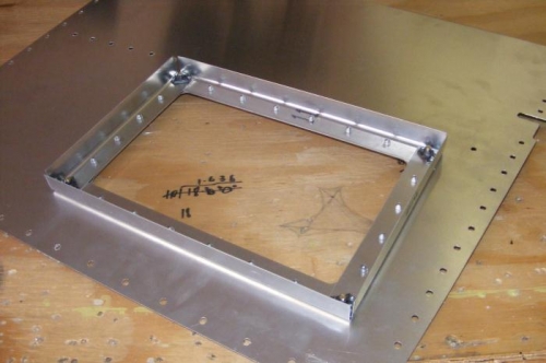 Seat pan access hatch for spar bolts.