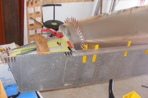 Taped and clamped in place.