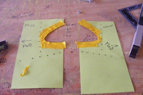 The cardboard templates used to make the cut.