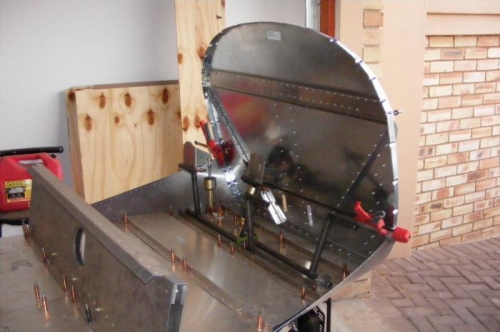 Firewall clamped in position for alignment.