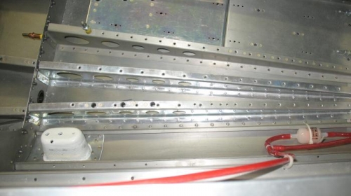 Outer two ribs of battery tray