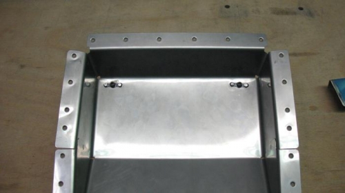 Firewall recess with nutplates for center cabin cover