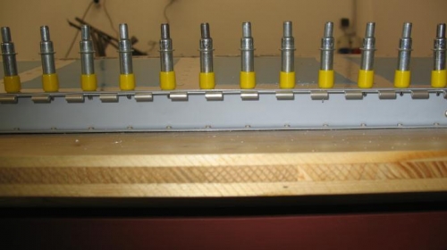 Close-up of elevator piano hinge